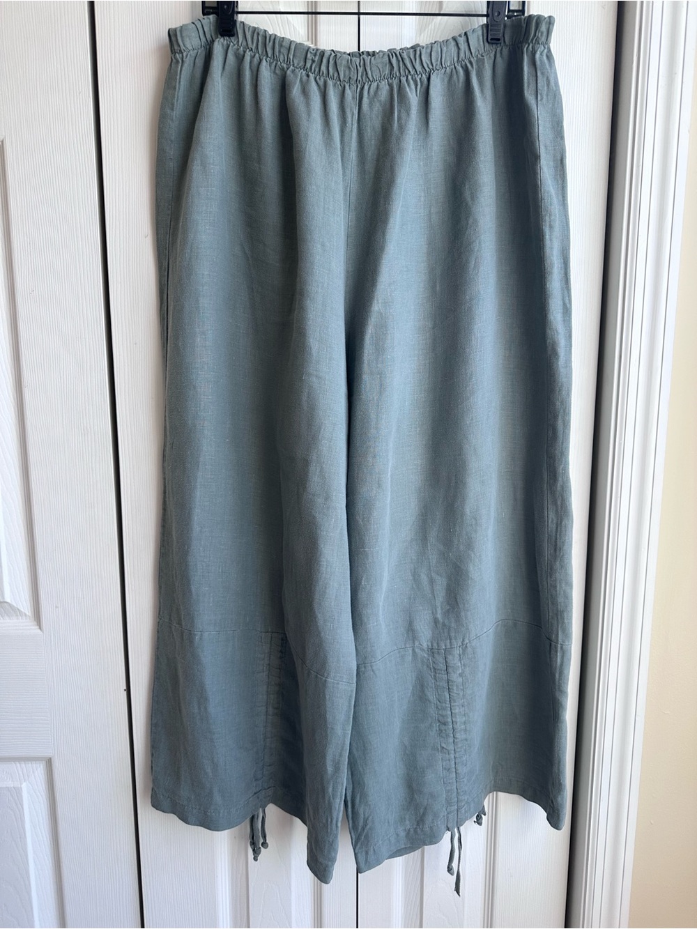 Bryn Walker sage green linen pants with drawstring at hem